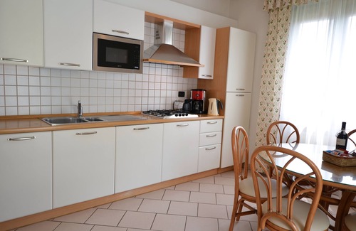 Riva del Garda House | Discover Residence Alle Palme: Oceanfront Oasis with Spa