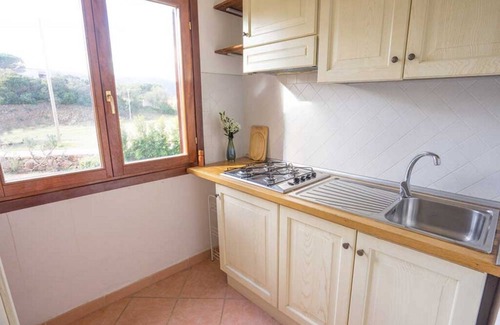 Baia Sant'Anna Apartment | Residence Baia Sant'Anna: Oceanfront Retreat with Pool