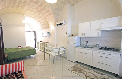Diso Apartment | Discover Residence Borgo Antico: Family-Friendly Getaway