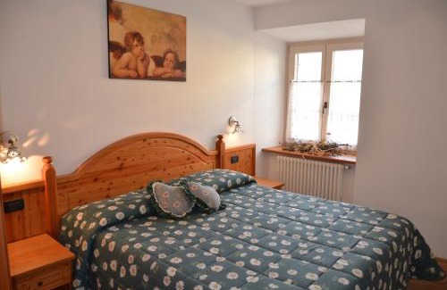Pellizzano Apartment | Oceanfront Residence Ca' Delle Margherite with Spa & Pool