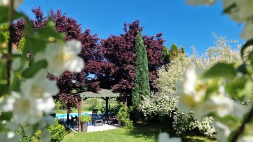 Zenica-Doboj Canton House | Cozy Residence Green: Oceanfront Retreat with Pool & Hot Tub