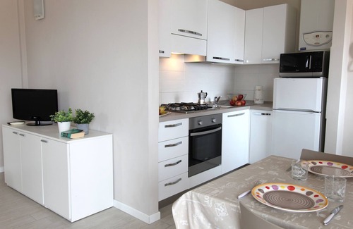 Rivoltella Apartment | Relax at the Residence of the Pines with Ocean View Amenities