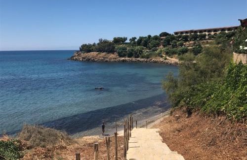 Anastasi III Apartment | Cozy Residence La Caletta: Oceanfront Stay with Pool Access
