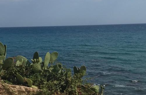 Anastasi III Apartment | Cozy Residence La Caletta: Oceanfront Stay with Pool Access