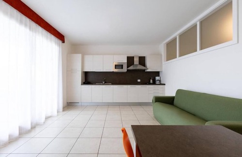 Torri del Benaco Hotel | Elegant Residence La Corte Danese with Pool & Family Amenities