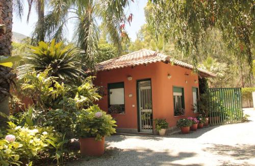 San Giorgio Apartment | Experience Residence le Palme Garden with Oceanfront Views