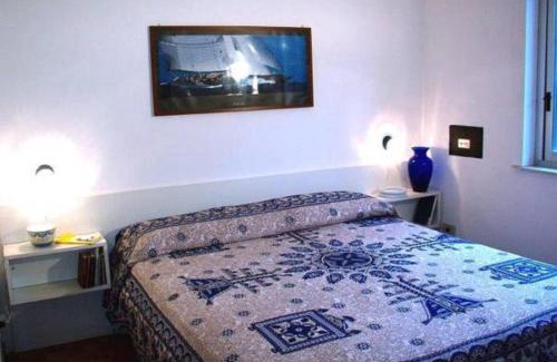 San Giorgio Apartment | Experience Residence le Palme Garden with Oceanfront Views