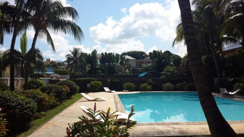 Flic-en-Flac Apartment | Affordable Stay at Residence Le Palmier with Pool & Family Fun