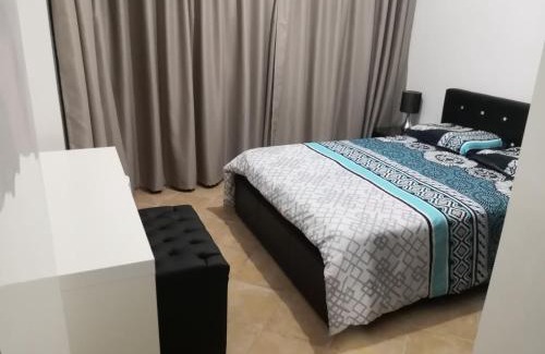 Cabo Negro Apartment | Experience Residence Lilac's Garden with Ocean Views