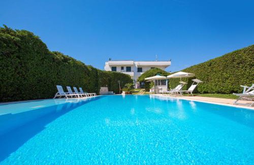 Torre Specchia Ruggeri Apartment | Residence Punta Cassano: Poolside Bliss by the Beach