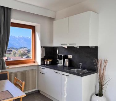 Tesimo Apartment | Discover Residence Rebgut: Guest Rated 8.7/10