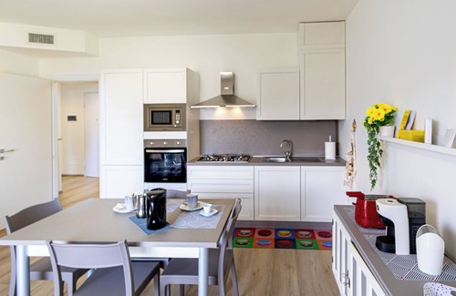 Arona Apartment | Discover Residence The Camellia Wheel 24 with Spa & Breakfast