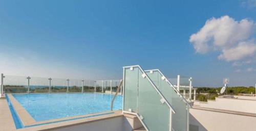 Santa Maria al Bagno Apartment | Oceanfront Escape: Residence Valentina with Pool Access