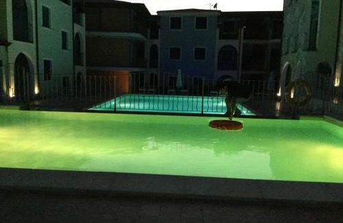 La Muddizza Apartment | Pet-Friendly Residence Valledoria 2 with Pool & Kitchen