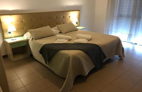 Est Apartment | Ideal Retreat at Residence Viale Venezia with Hot Tub Access