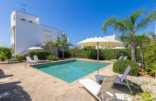 Santa Maria al Bagno Apartment | Discover Residence Viva: Pools, Garden & Ocean Views