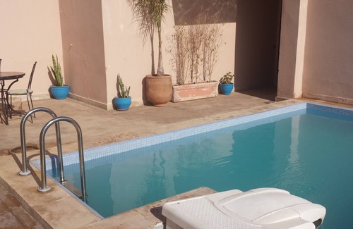 Gueliz Apartment | Rooftop Pool Retreat: Central Apartment with Terrace