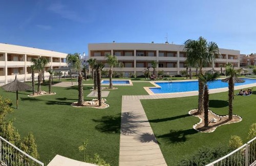 Puerto Marino Apartment | Relax at Residencia Bahía: Oceanfront Poolside Retreat