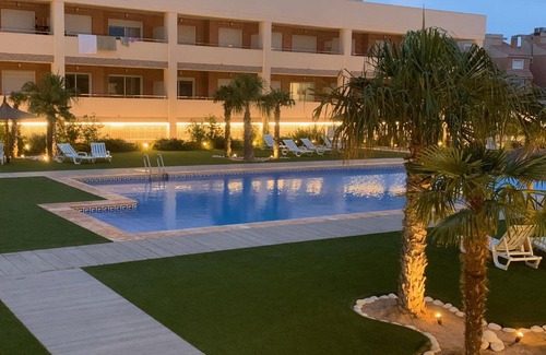 Puerto Marino Apartment | Relax at Residencia Bahía: Oceanfront Poolside Retreat