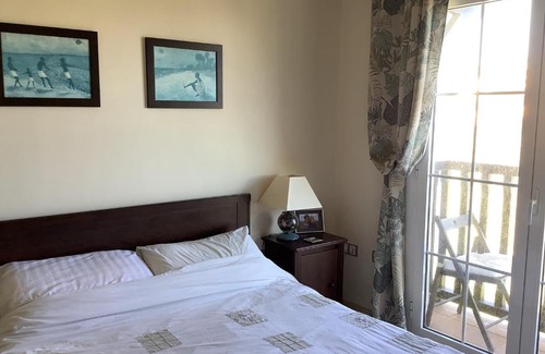 San Luis de Sabinillas Apartment | Discover Residencia Duquesa: Family-Friendly with Pool