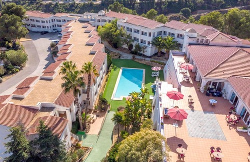 La Colina Apartment | Relax at Residencia Montebello with Pool & Pet-Friendly Perks