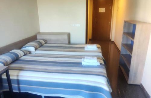 San Vicente Other | Discover Residencia Universitaria Hernan Cortes: Pool & Dining