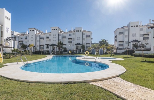 San Luis de Sabinillas Apartment | Inviting Residencial Duquesa: Pool, Spa & Family-Friendly