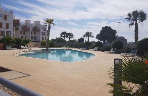 El Medano Apartment | Oceanfront Bliss at Residencial Los Martines, Rated 9.6/10