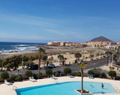 El Medano Apartment | Oceanfront Bliss at Residencial Los Martines, Rated 9.6/10