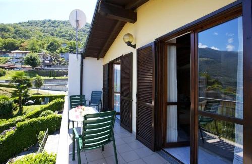 Pino Lago Maggiore Apartment | Child-Friendly Retreat at Residenza Arcobaleno - Rated 9/10