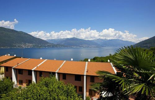 Pino Lago Maggiore Apartment | Child-Friendly Retreat at Residenza Arcobaleno - Rated 9/10