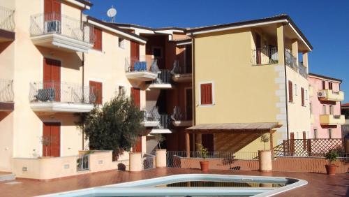 La Muddizza Apartment | Budget-Friendly Residenza I Gabbiani with Pool & Hot Tub