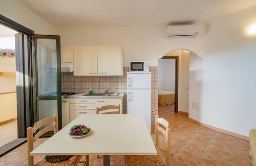 Tergu Apartment | Relax at Residenza Le Farfalle with Private Pool Access