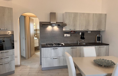 Limpiddu Apartment | Experience Residenza Limpiddu: Pool and Sea Views Await