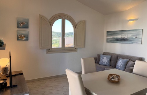 Limpiddu Apartment | Relax at Limpiddu Residence: Pool & Panoramic Ocean Views