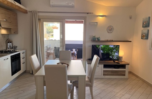 Limpiddu Apartment | Relax at Limpiddu Residence: Pool & Panoramic Ocean Views