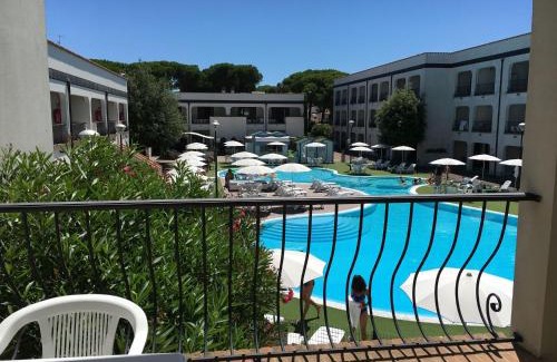 Lido di Spina Apartment | Cozy Beachside Apartment with Pool and Kitchen Amenities
