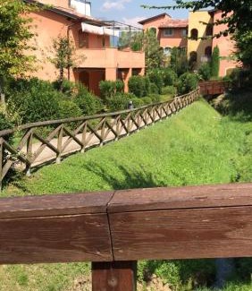 Manerba del Garda Apartment | Experience Resort Borgo del Torchio with Oceanfront Views