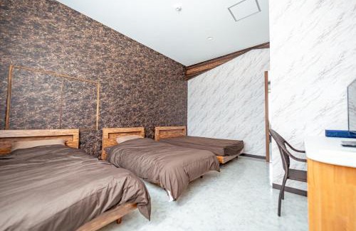 Ishigaki Hotel | Discover リゾートイン青の洞窟: Poolside Family Retreat