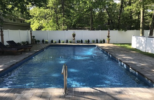 East Quogue House | Chalet Retreat with Heated Pool and Ocean Views - Rated 9.8