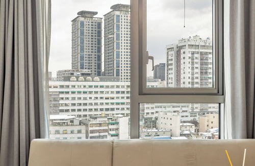 Jung-gu Apartment | City View Retreat with Spa, High Floor & Family Amenities