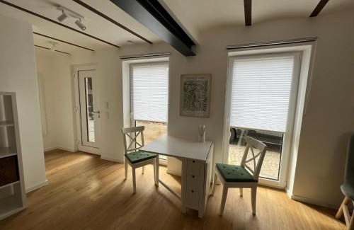 Großfischlingen Apartment | Historic Building with Private Courtyard and Parking