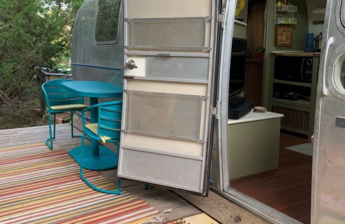 Austin House | Cozy Restored Airstream with Private Wooded Patio Escape
