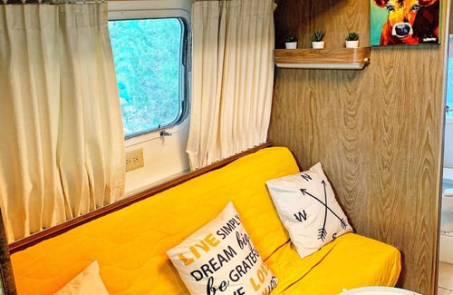 Austin House | Cozy Restored Airstream with Private Wooded Patio Escape