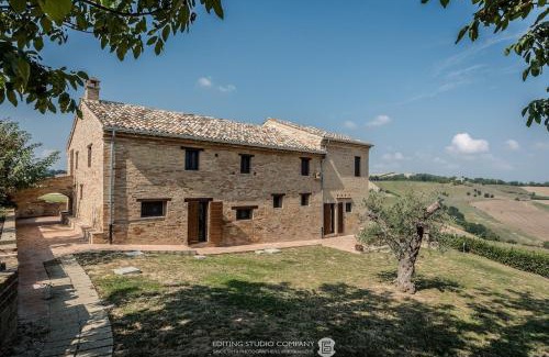 Montegiorgio Villa | Restored Italian Farmhouse with Cottage, Pool & Views