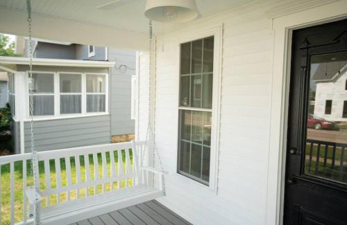 Maquoketa House | Beautifully Restored Queen Anne Cottage with Family-Friendly Amenities