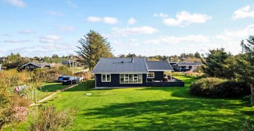 Lonstrup House | Charming Restored Summer Cottage Steps from the Beach