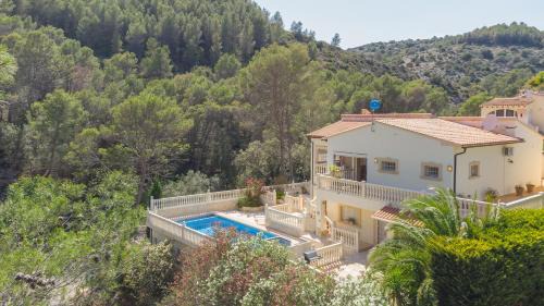Orba Villa | Retiro Sol - Casa Joni: Ideal for Families with Pool Access