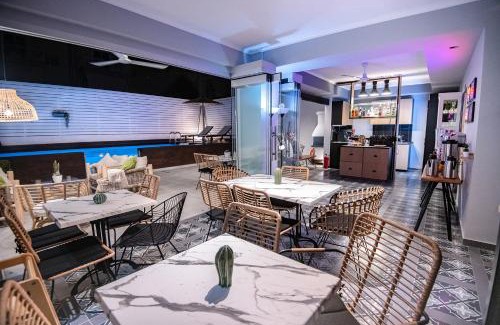 Olymbiaki Akti Apartment | Vintage Luxury Rooms with Ocean View and Pool Access