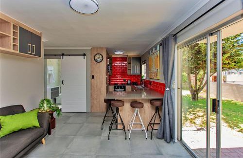 Langebaan Apartment | Retro Rest: Oceanfront Escape with Pool & Family Amenities